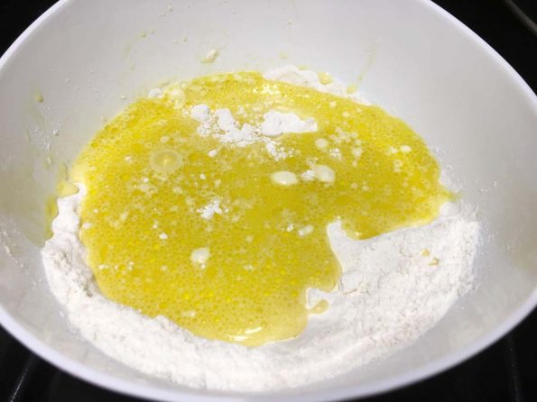 mix egg yolk mixture with flour