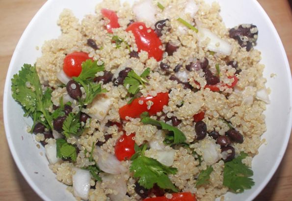 quinoa black salad with tomatoes and onions