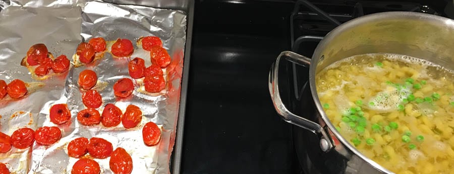 cooking pasta with cherry tomatoes