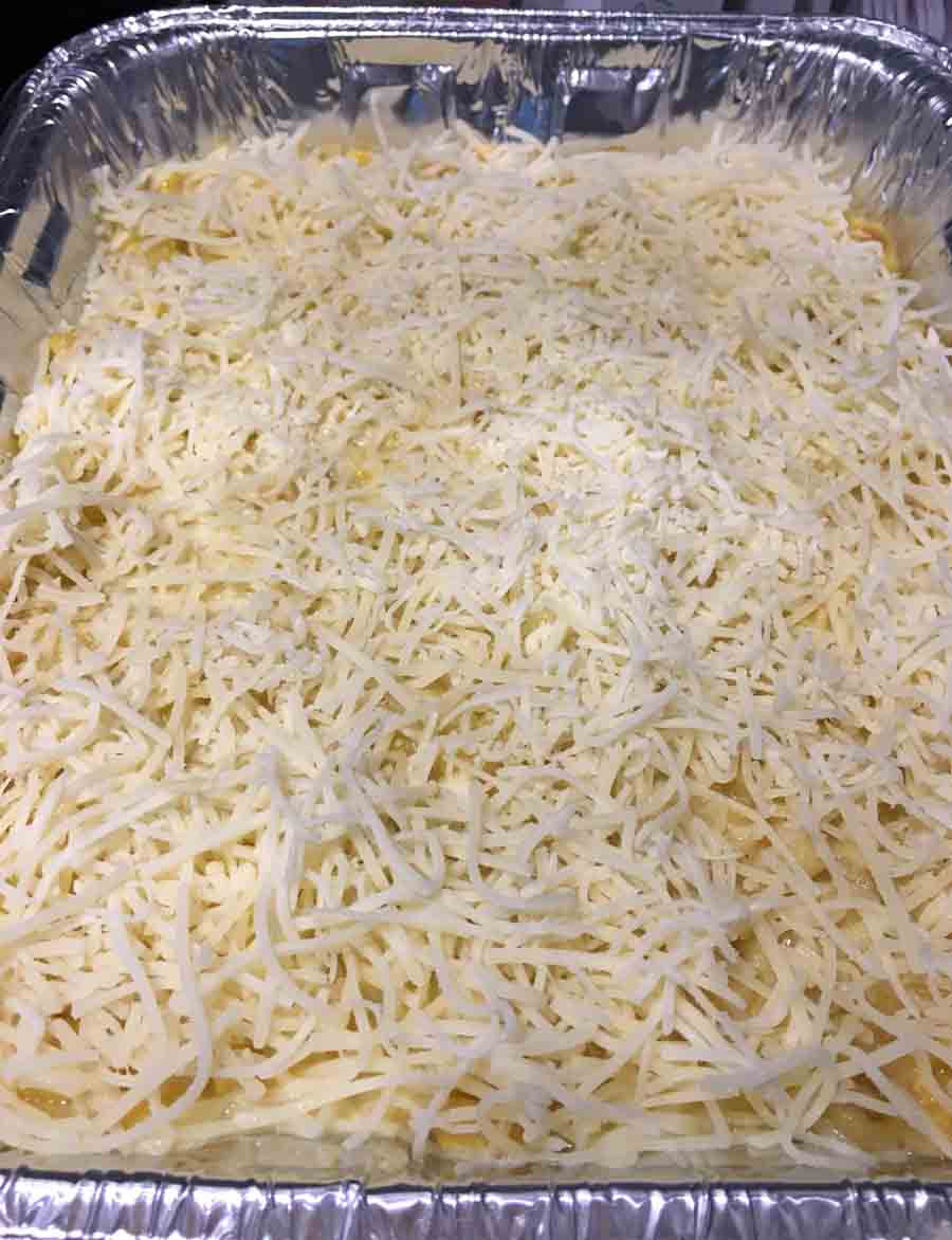 shredded cheese on pasta