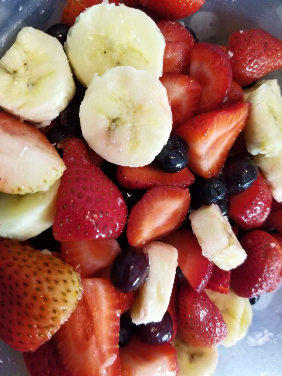 berry banana fruit salad with strawberries, blueberries and bananas
