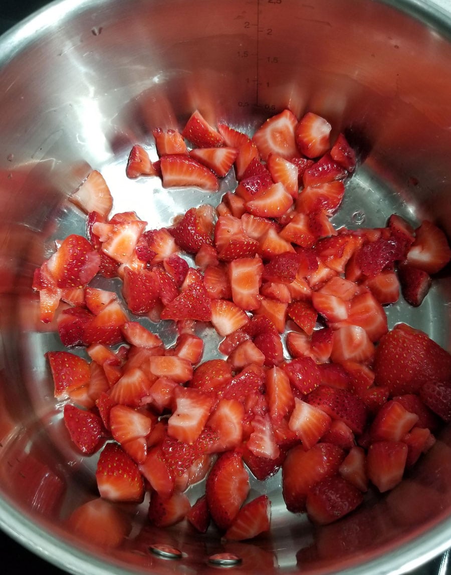 add strawberries to saucepan