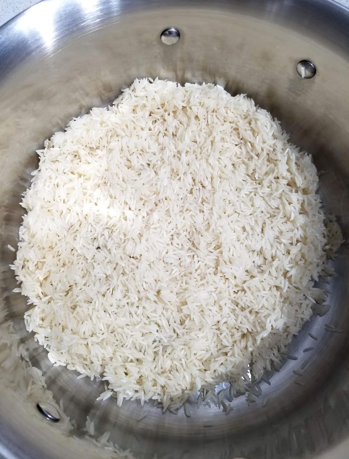 rinsed white basmati rice in pan