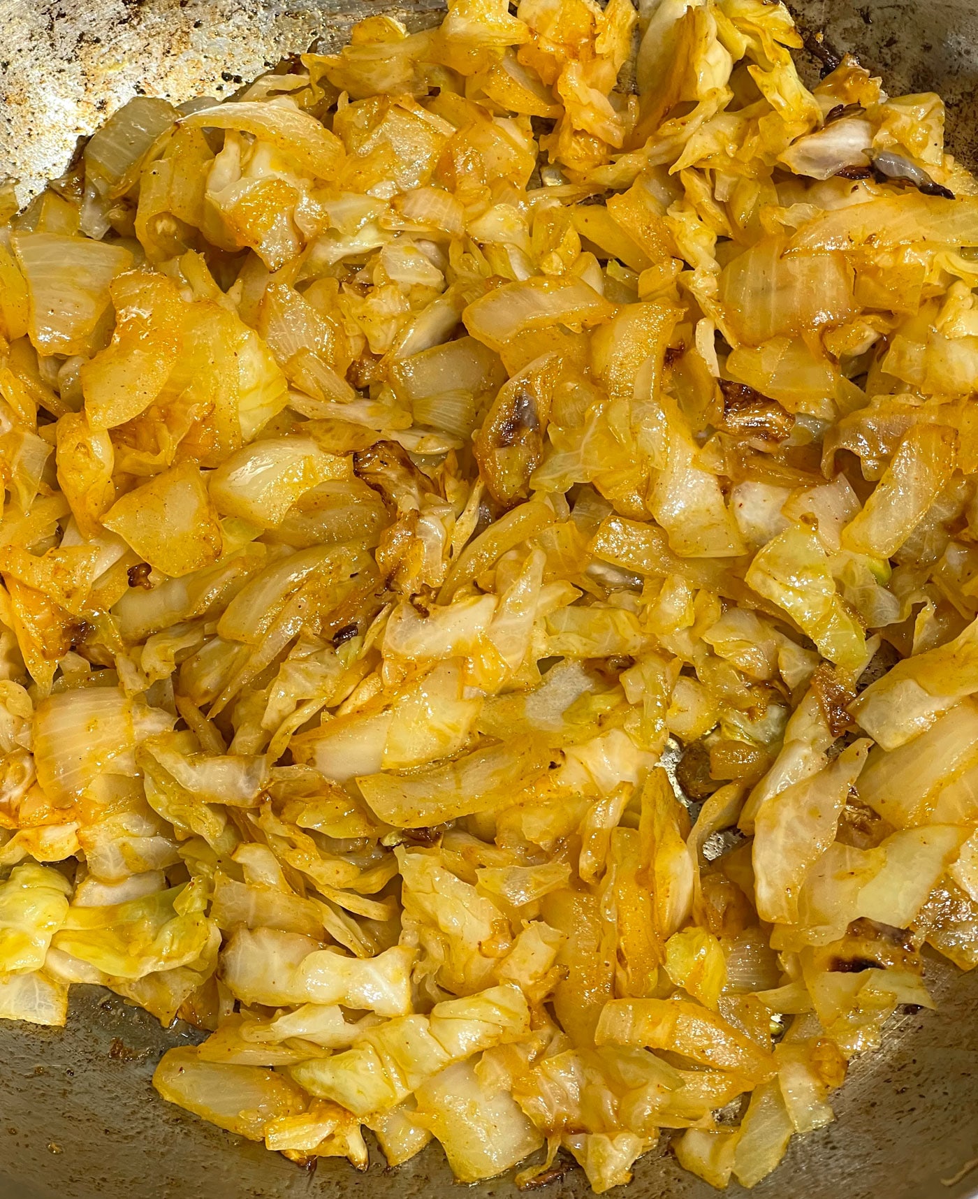 making fried cabbage and onions