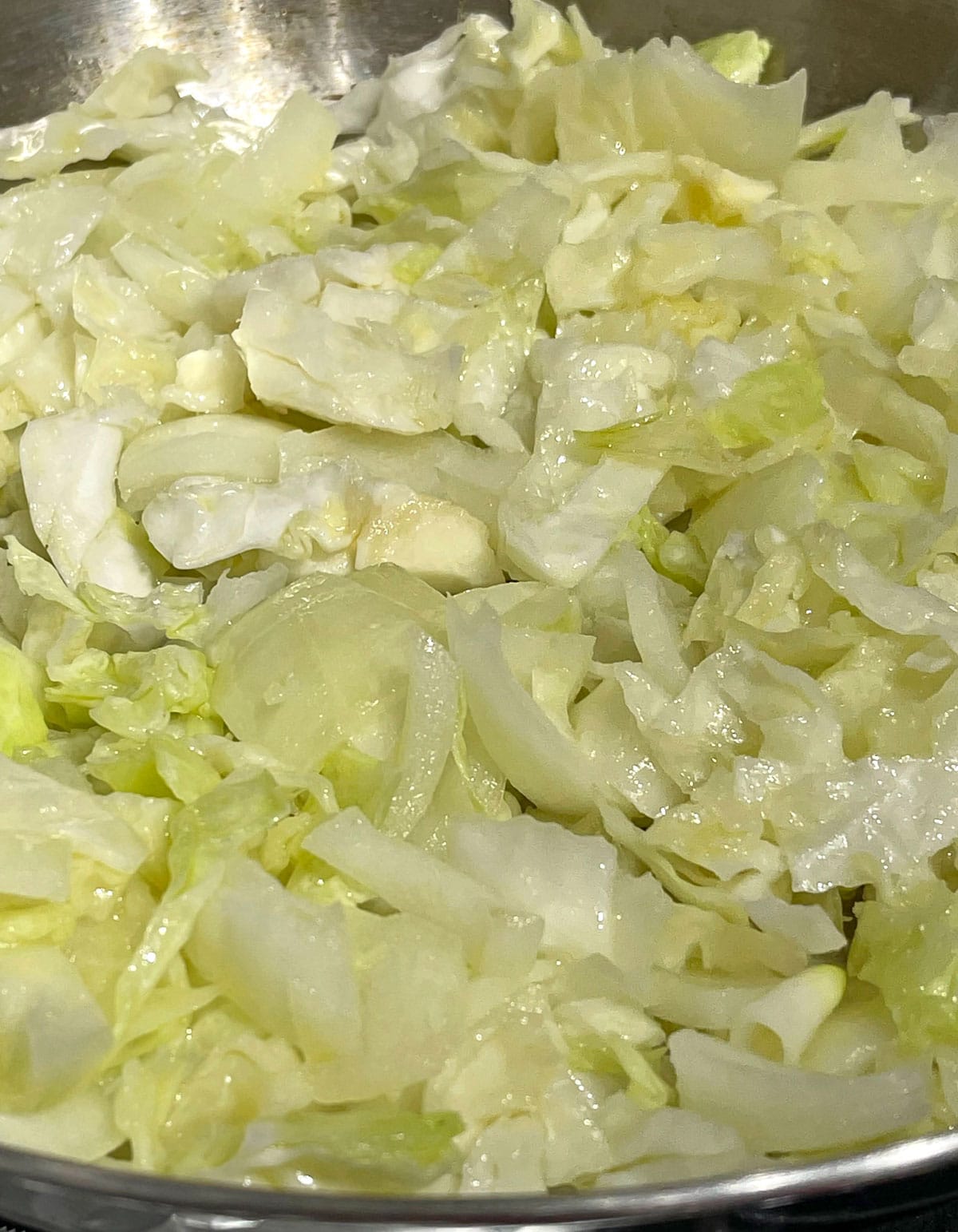 cooking cabbage and onions