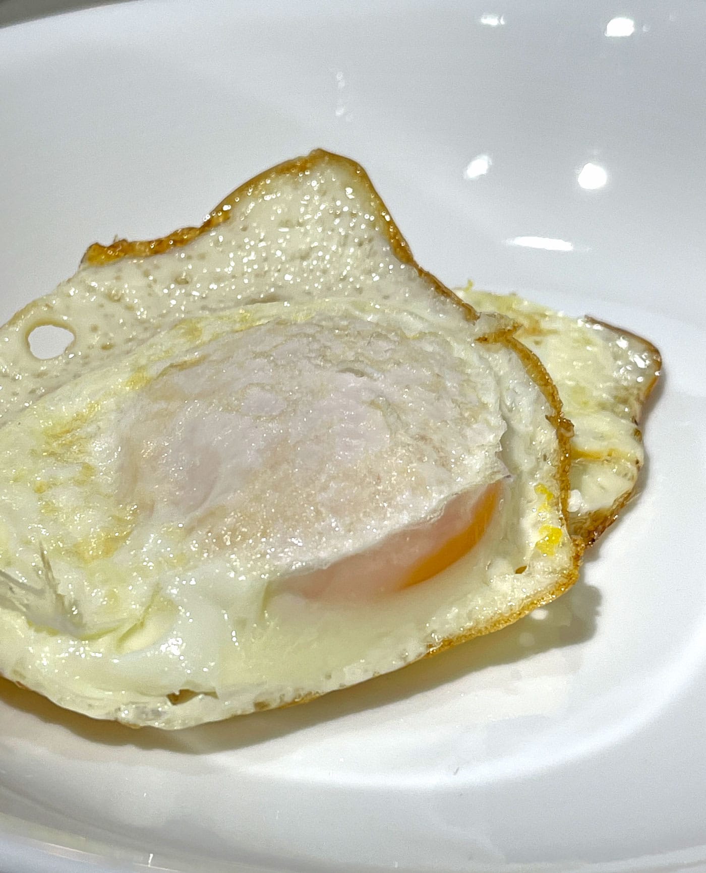fried eggs in serving plate