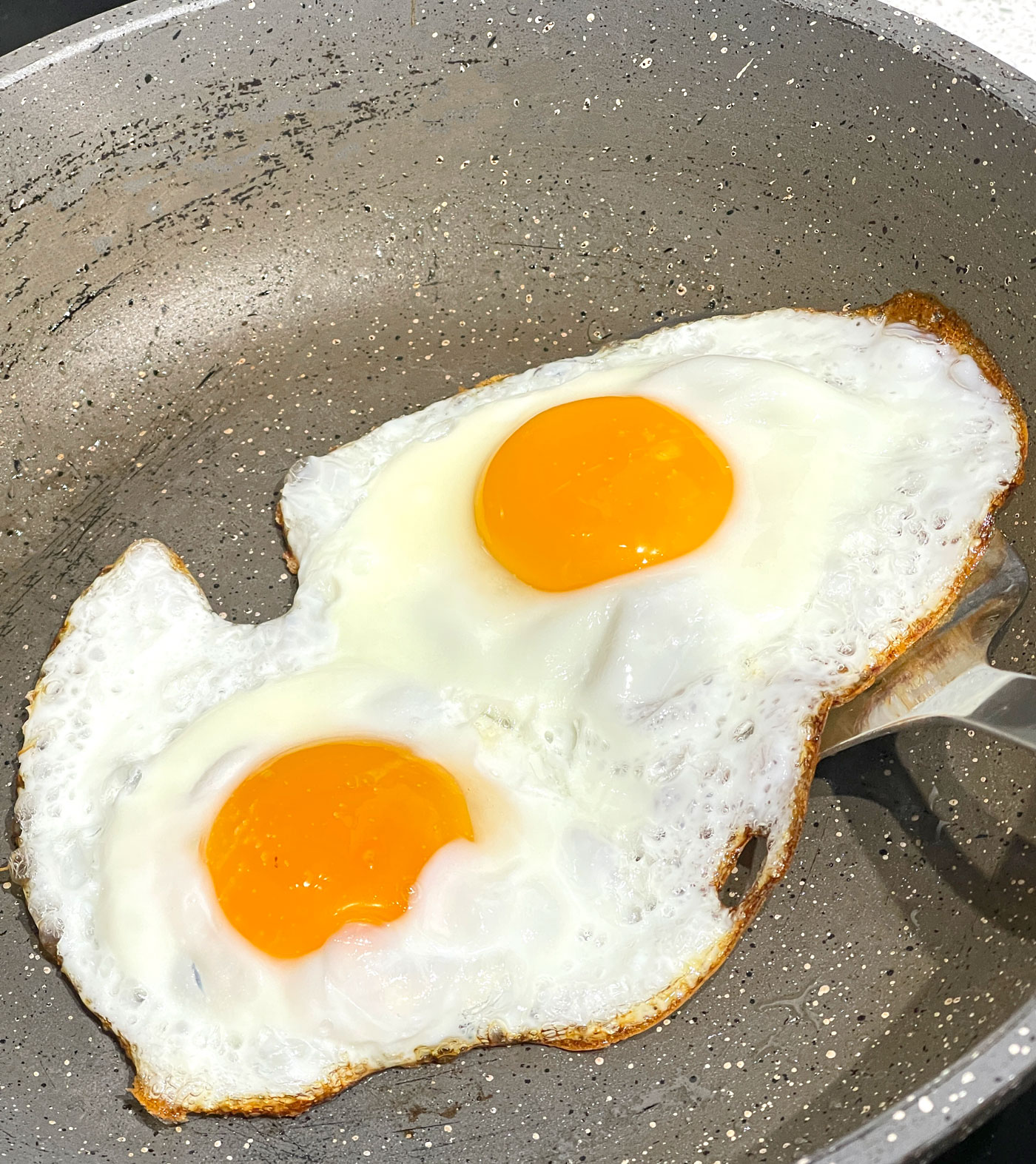 flipping fried eggs