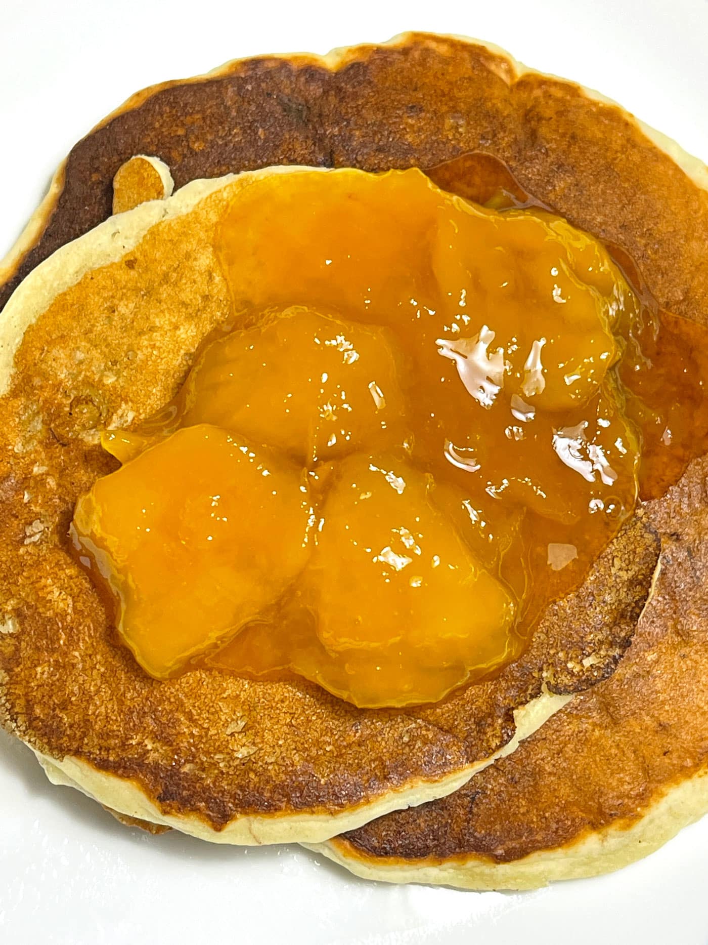 mango sauce topping on pancakes