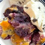 mixed berry cobbler served with ice cream
