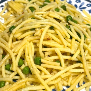 rice spaghetti noodles with peas, butter, garlic