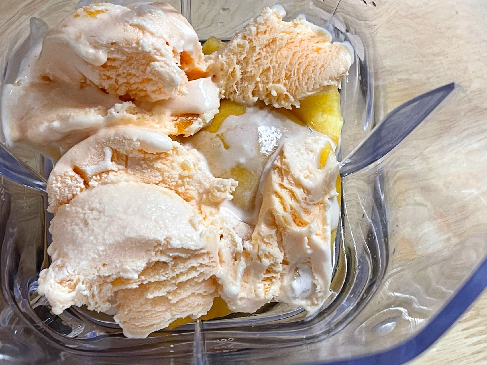 peach ice cream added to blender
