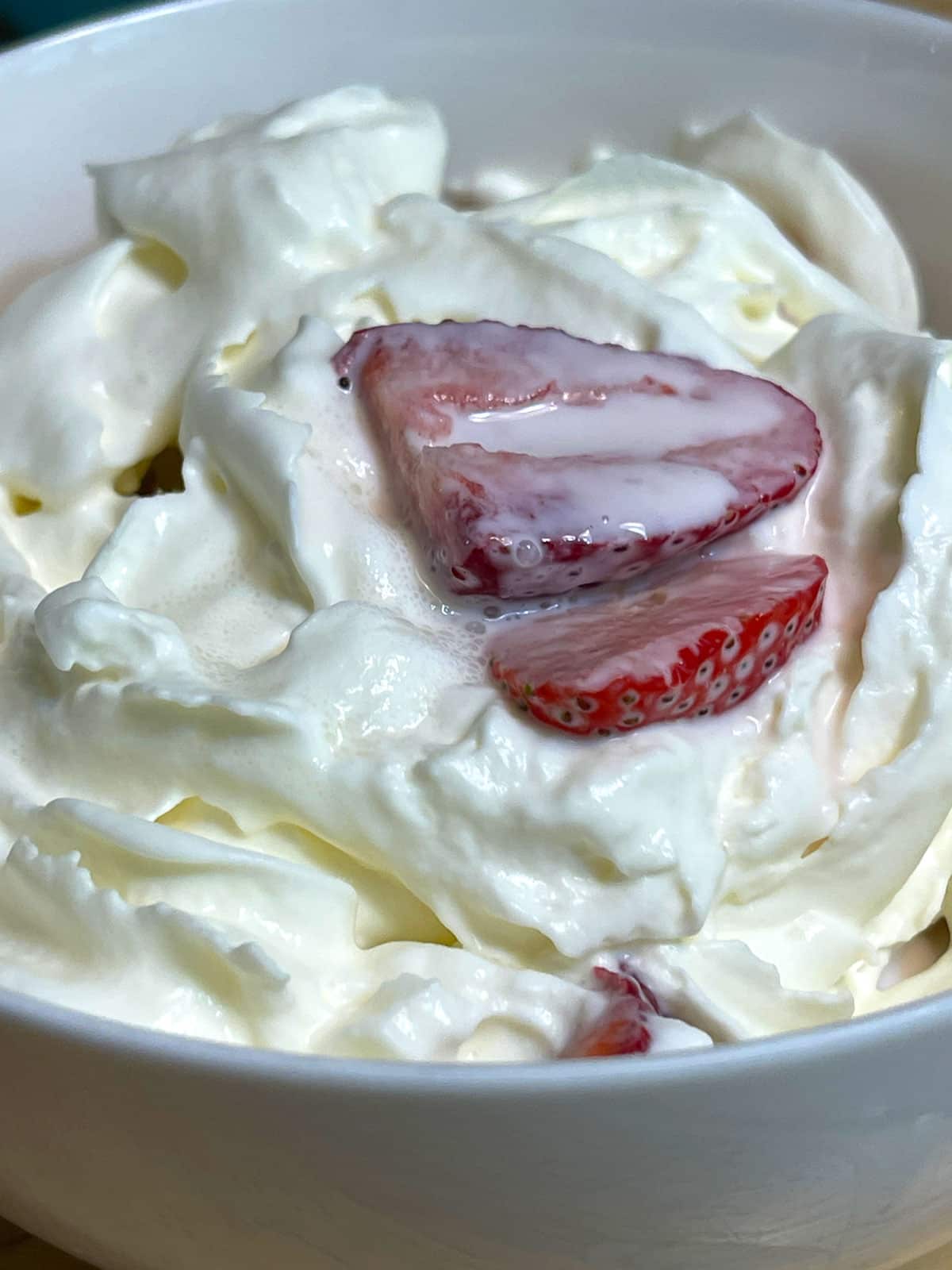 strawberries and cream with whipped cream topping