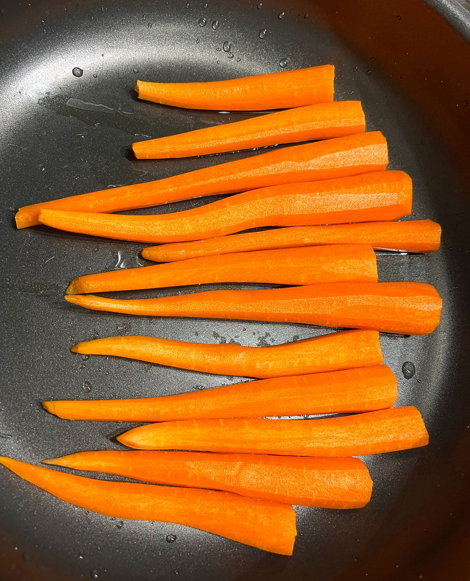 preparing carrots for roasting