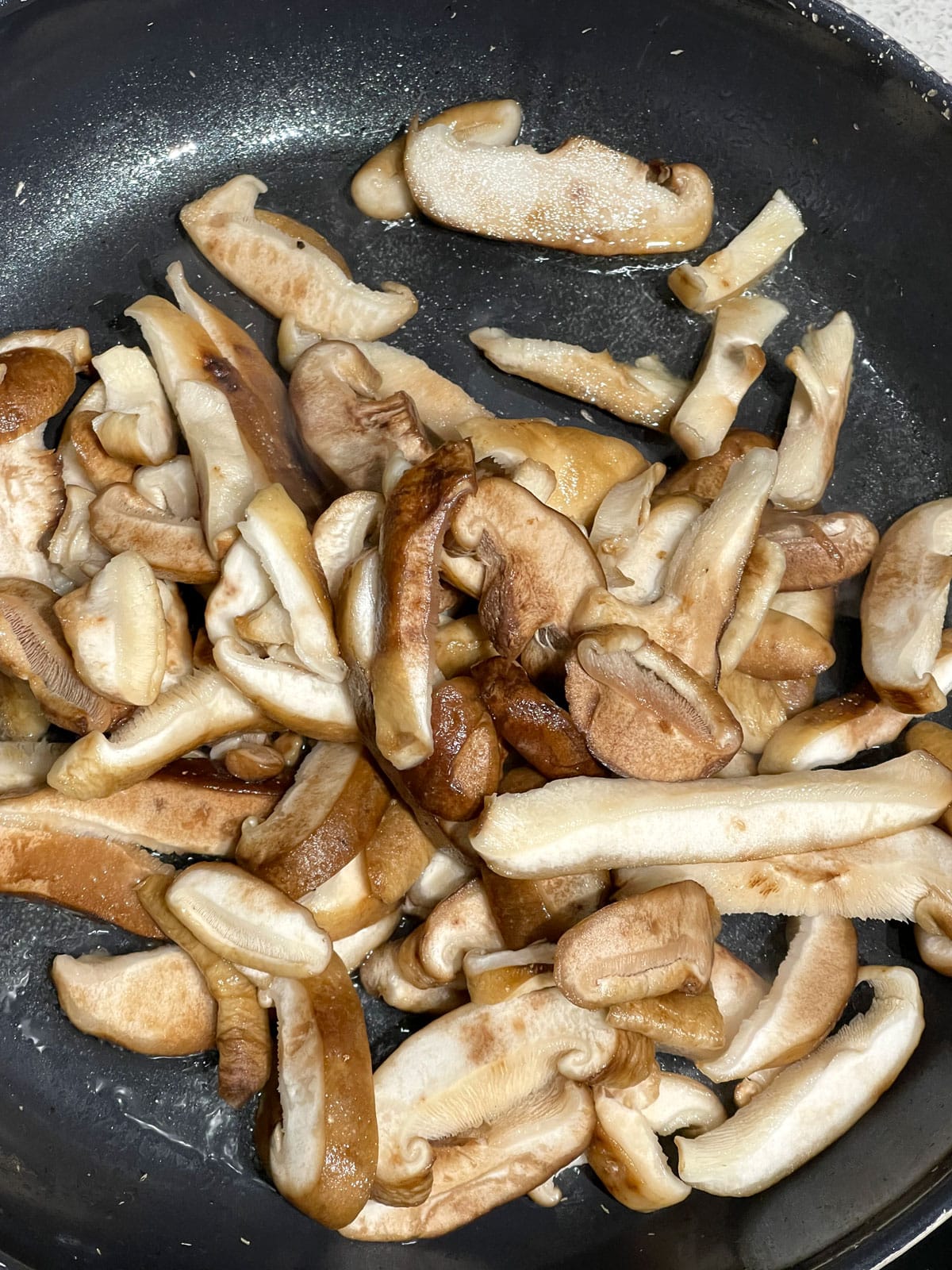 shiitake mushrooms in pan