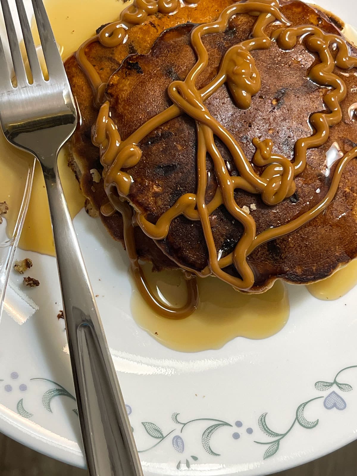 crispy oat milk pancakes topped with maple syrup, caramel